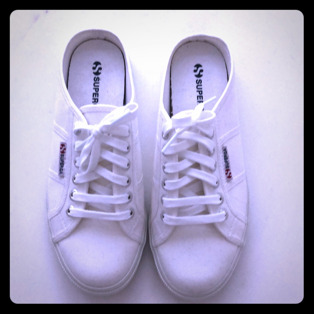 Brand new, never worn, superfamily slip ons